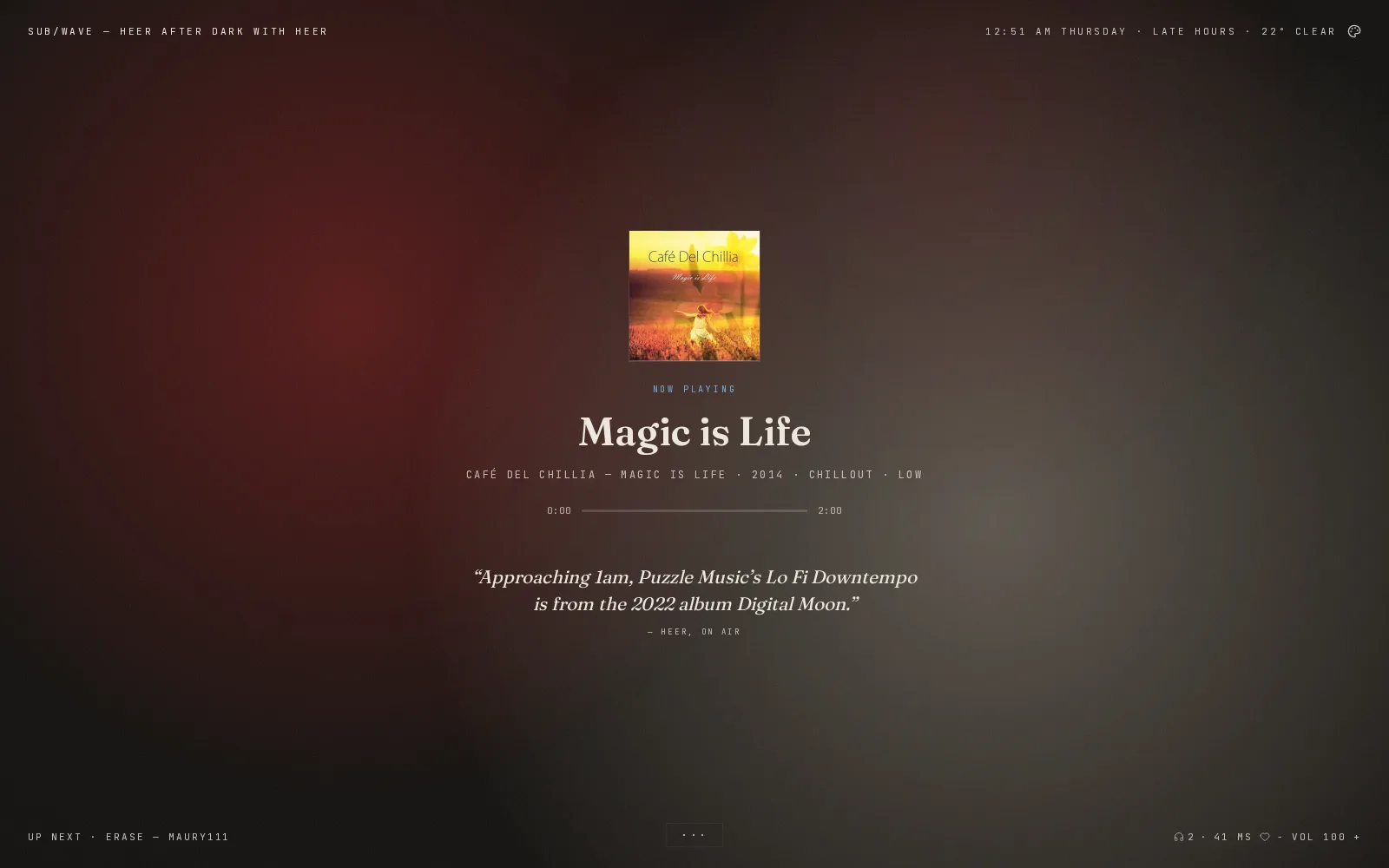 The Drift skin in Classic Dark: the cover art small and centred in a dark red haze, the track title in serif below it, a thin progress line, and the DJ's last line in italics